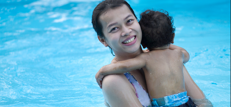 child learning to swim