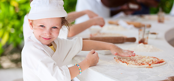 Picky chef making pizza