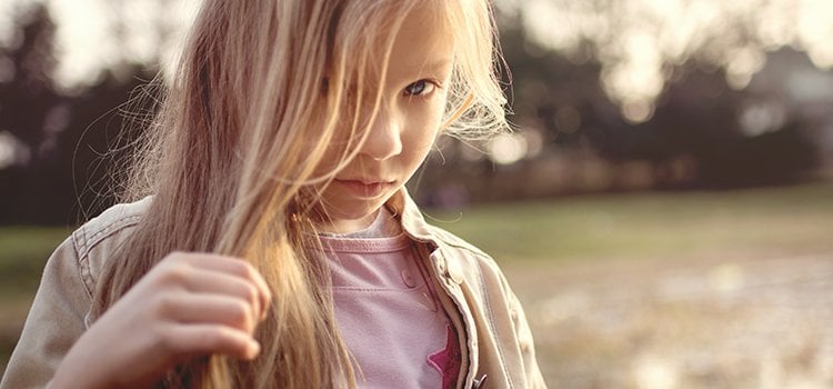 shy child worried about going to summer camp