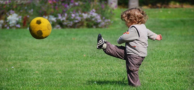 toddler trying out soccer