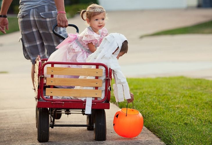 costumed kids in wagon