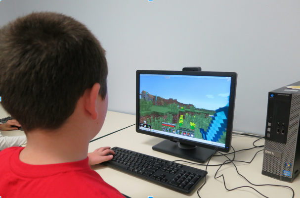 Kid playing minecraft